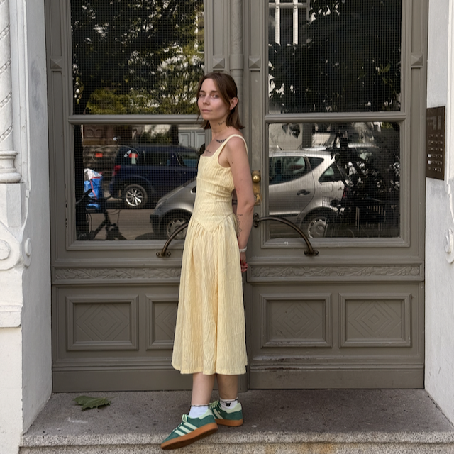 wore beautiful dresses and was the prettiest flower in the world.